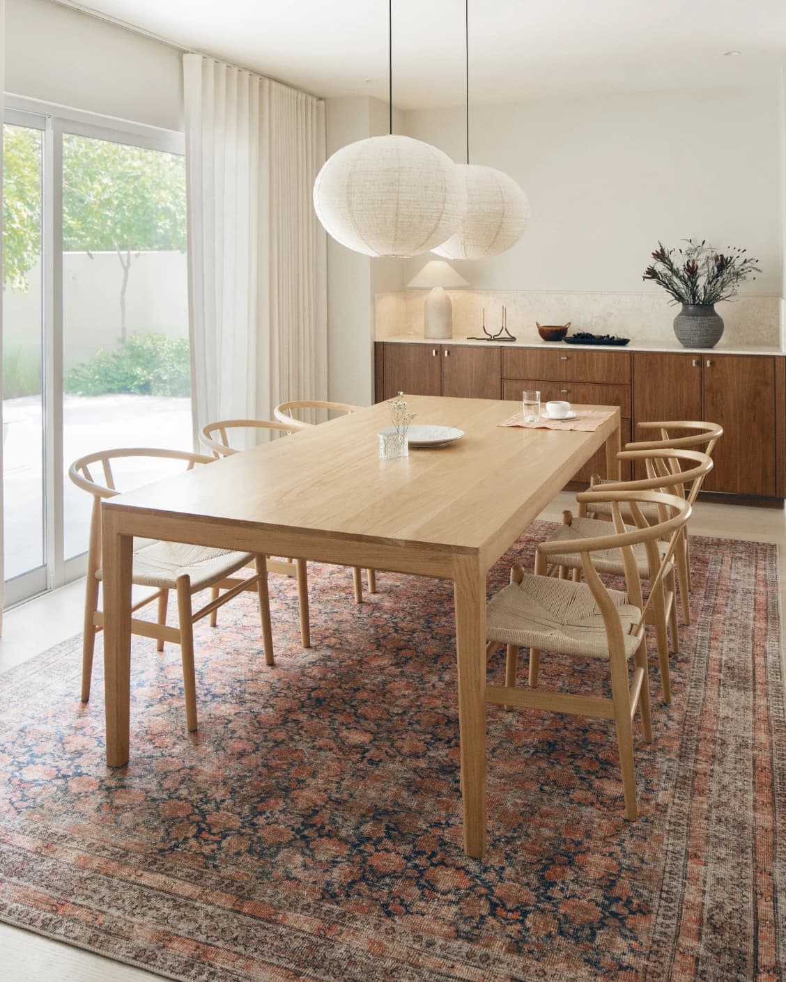 Vincent Terracotta carpet in rust and multicolour, shown in a lifestyle left view as image 19