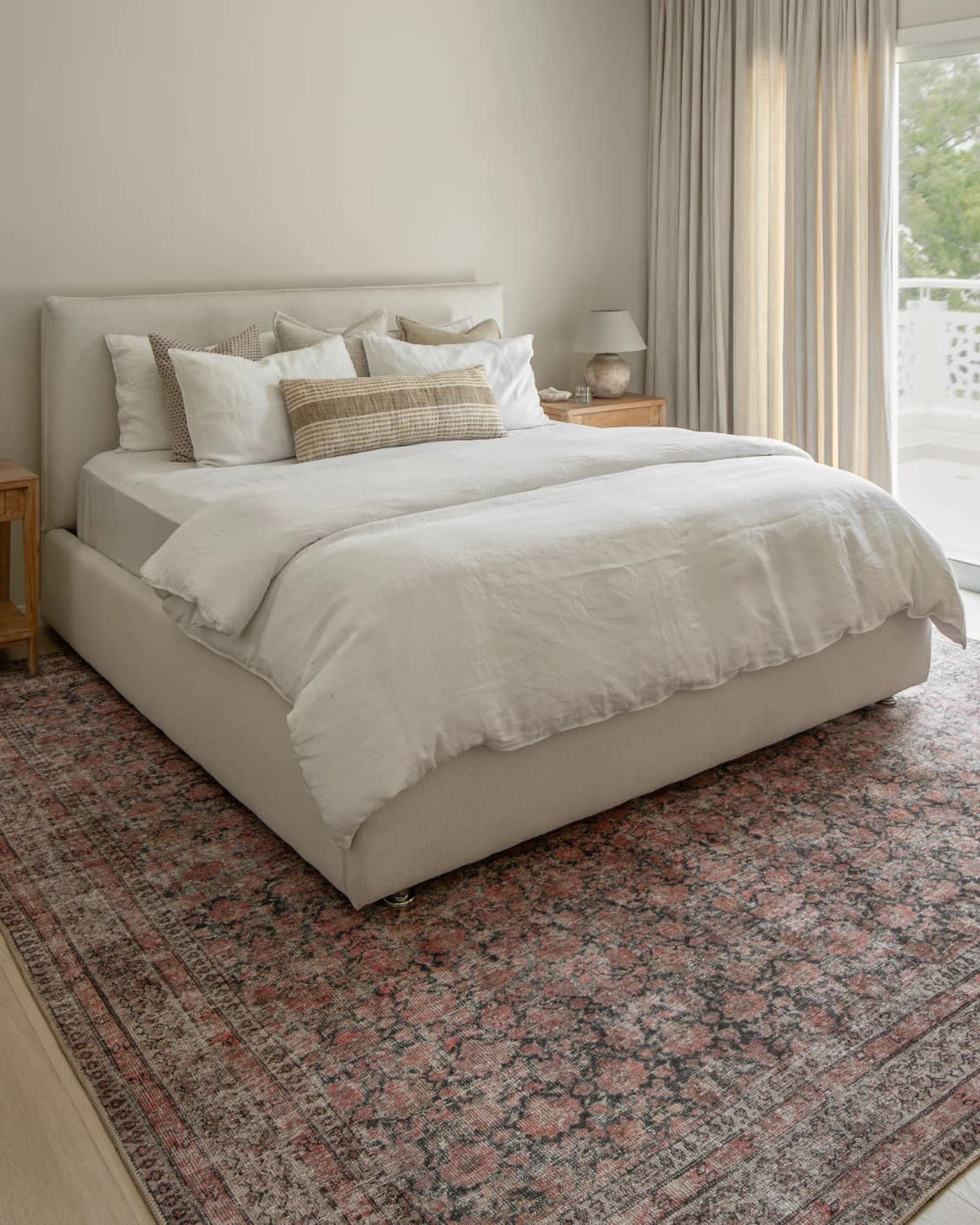 Vincent Terracotta carpet in rust and multicolour, shown in a lifestyle left view as image 25