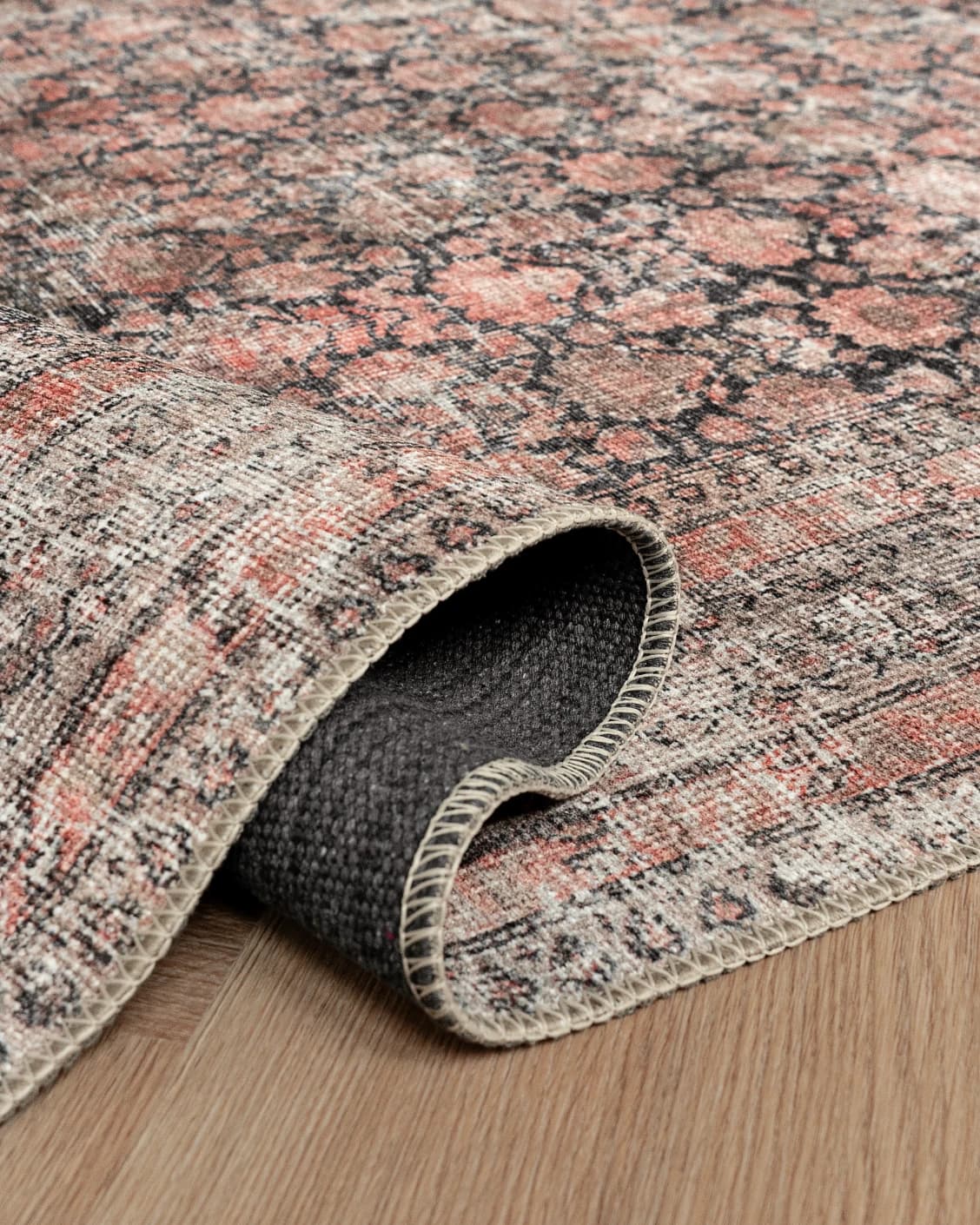Vincent Terracotta carpet in rust and multicolour, shown in a product close-up as image 36