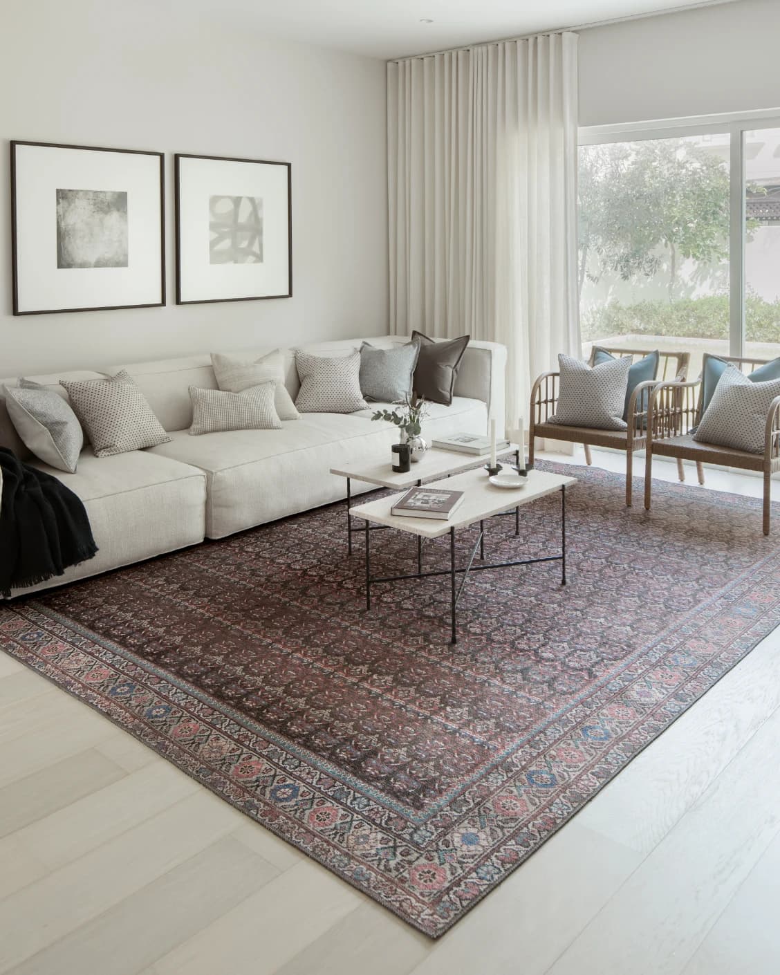 Vincent Umber carpet in red, blue and multicolour, shown in a lifestyle front view as image 7