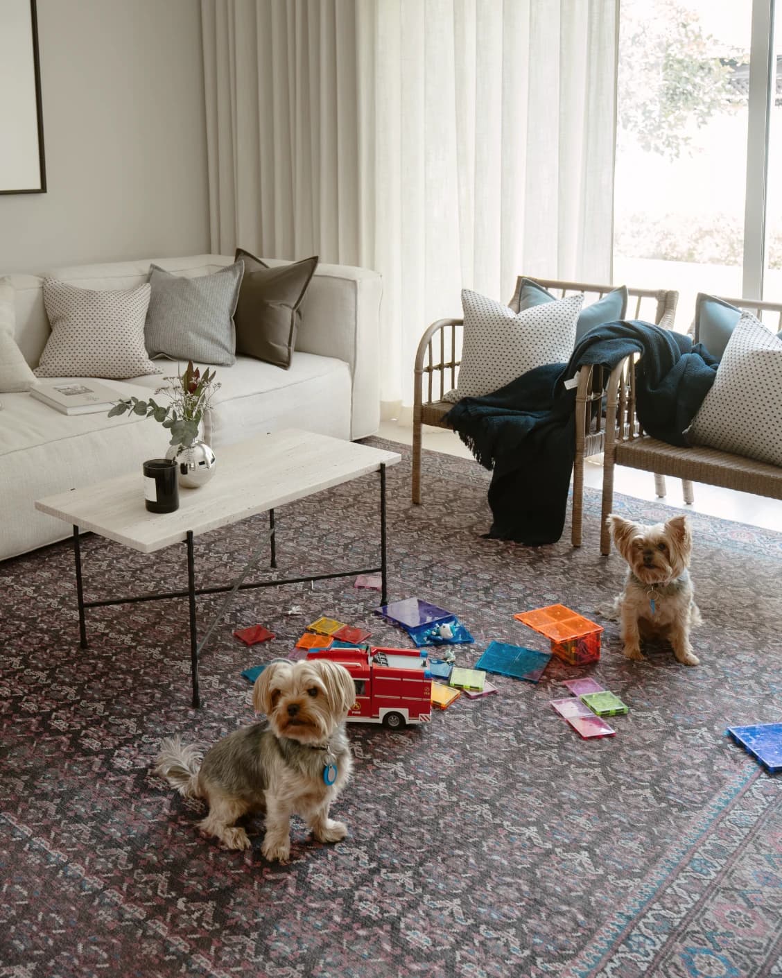 Vincent Umber carpet in red, blue and multicolour, shown in a lifestyle left view as image 19