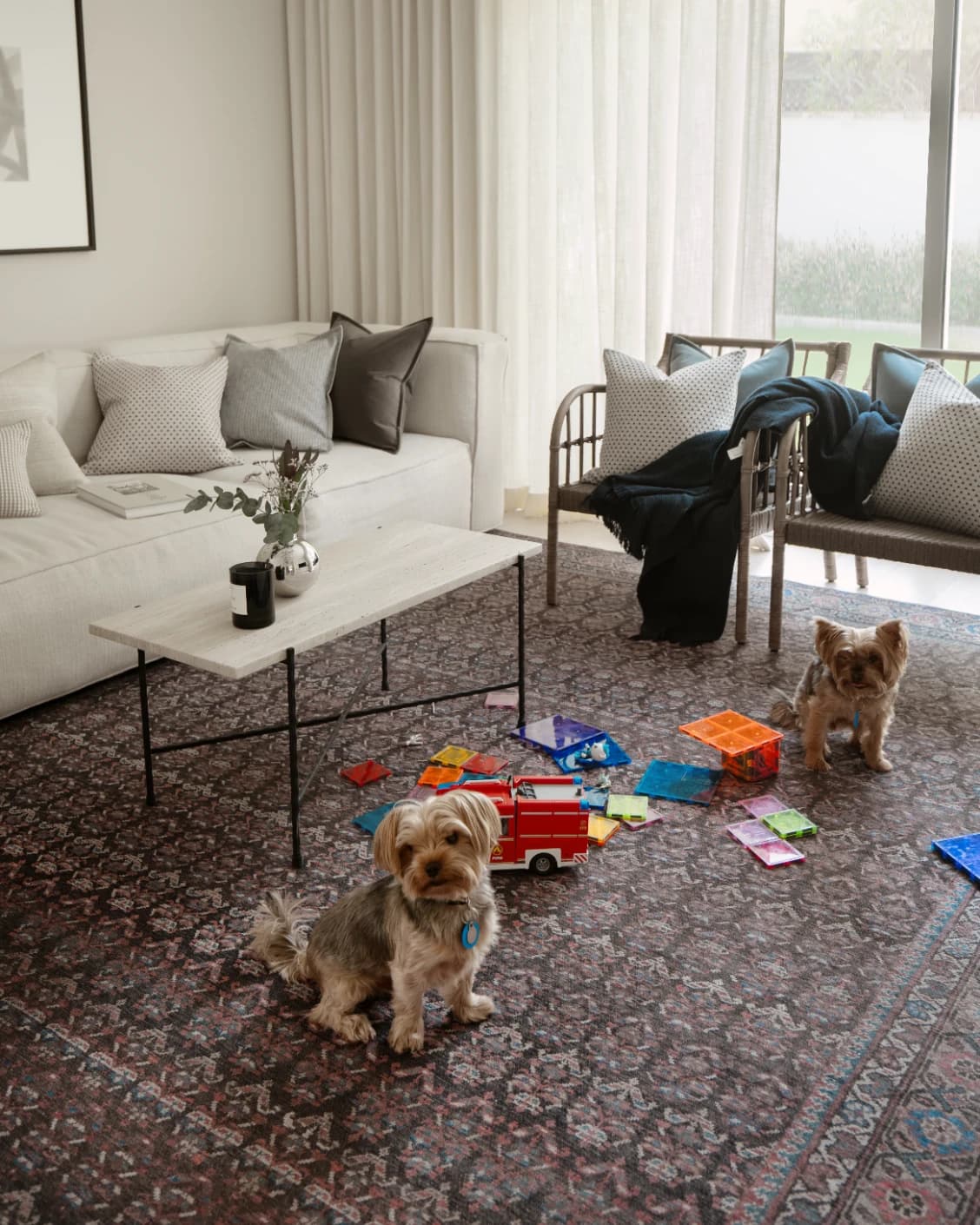 Vincent Umber carpet in red, blue and multicolour, shown in a lifestyle left view as image 18