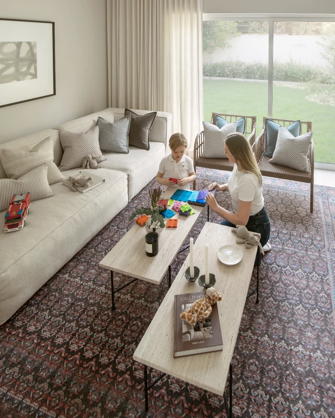 Vincent Umber carpet in red, blue and multicolour, shown in a lifestyle top view as image 20