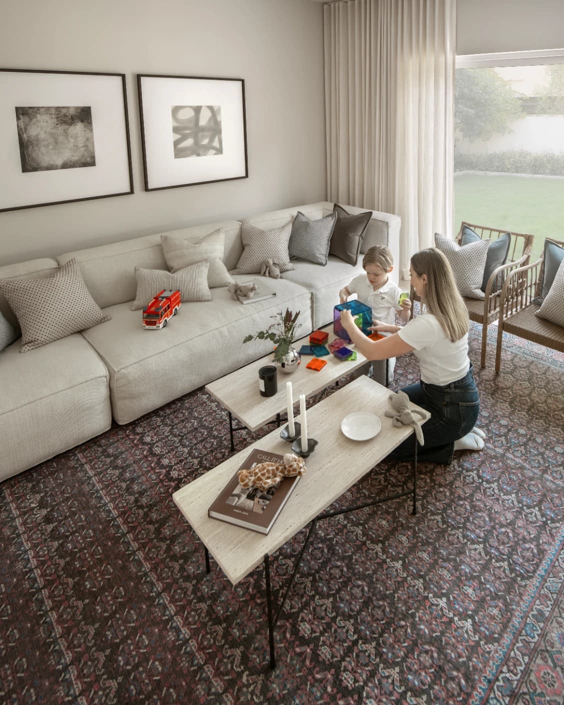 Vincent Umber carpet in red, blue and multicolour, shown in a lifestyle top view as image 21