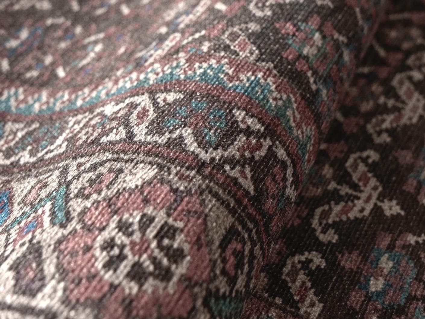 Vincent Umber carpets in red, blue and multicolour, shown in a product close-up as image 2