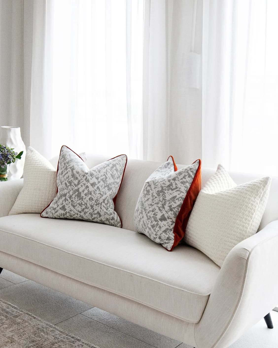 Vivien Bundle cushion in white and silver, shown in a lifestyle front view as image 2