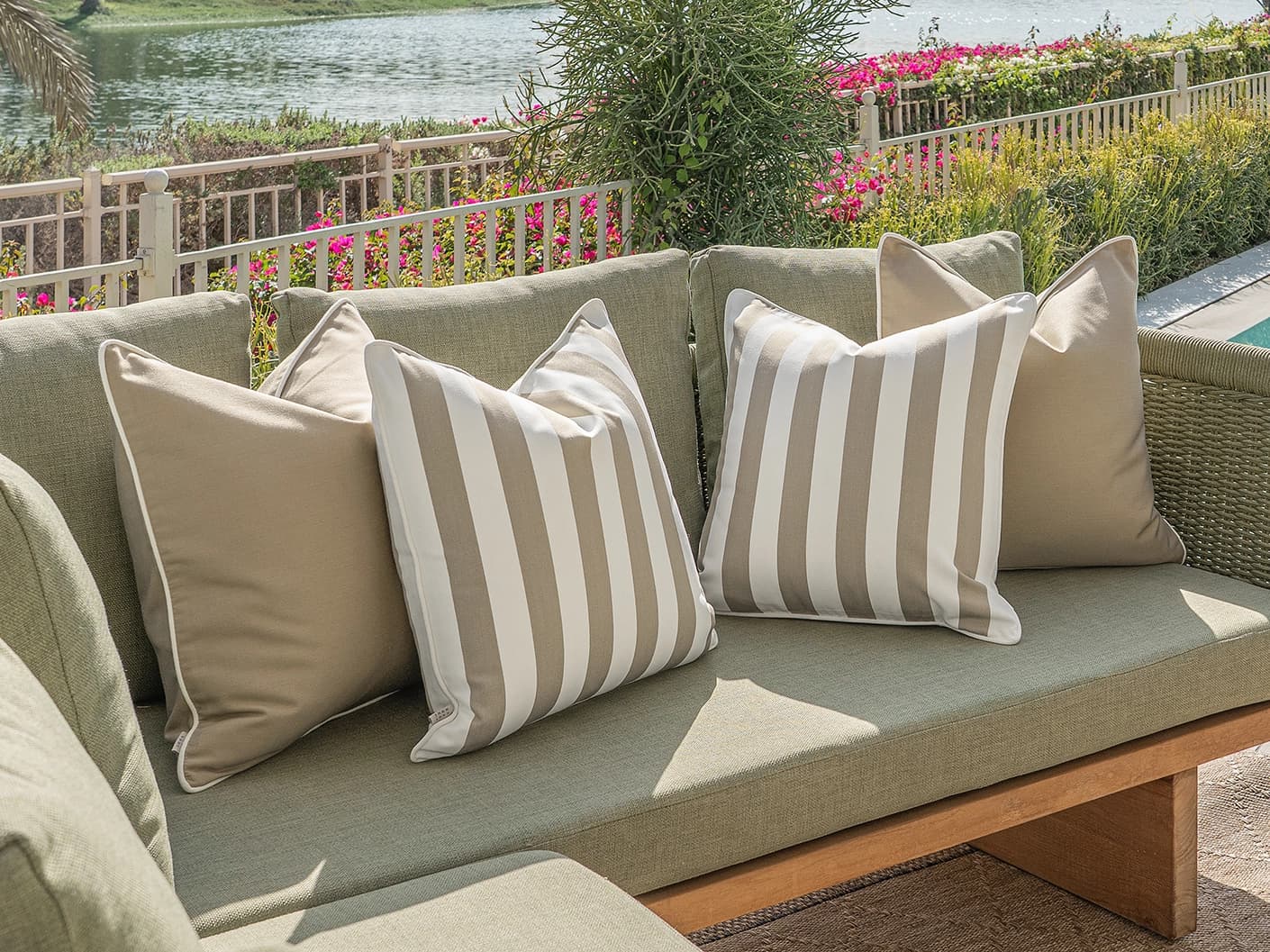 Vrithi Bundle bundle cushions in beige, shown in a lifestyle front view