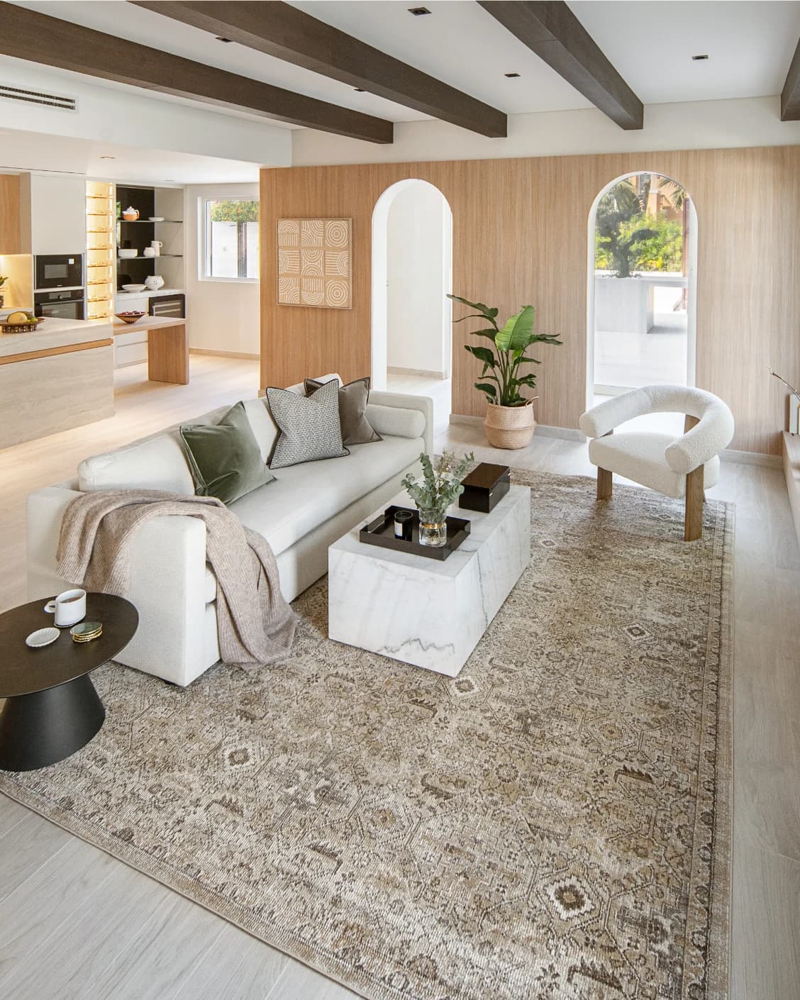 Warren Clay carpet in brown and beige, shown in a lifestyle left view as image 5