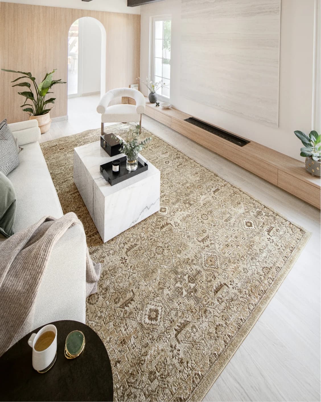 Warren Clay carpet in brown and beige, shown in a lifestyle left view as image 7