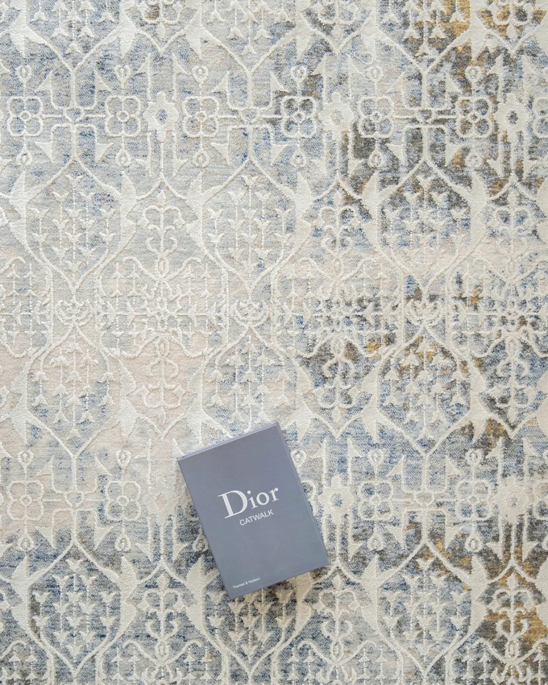 William Sandy carpet in beige, yellow and grey, shown in a lifestyle top view as image 7