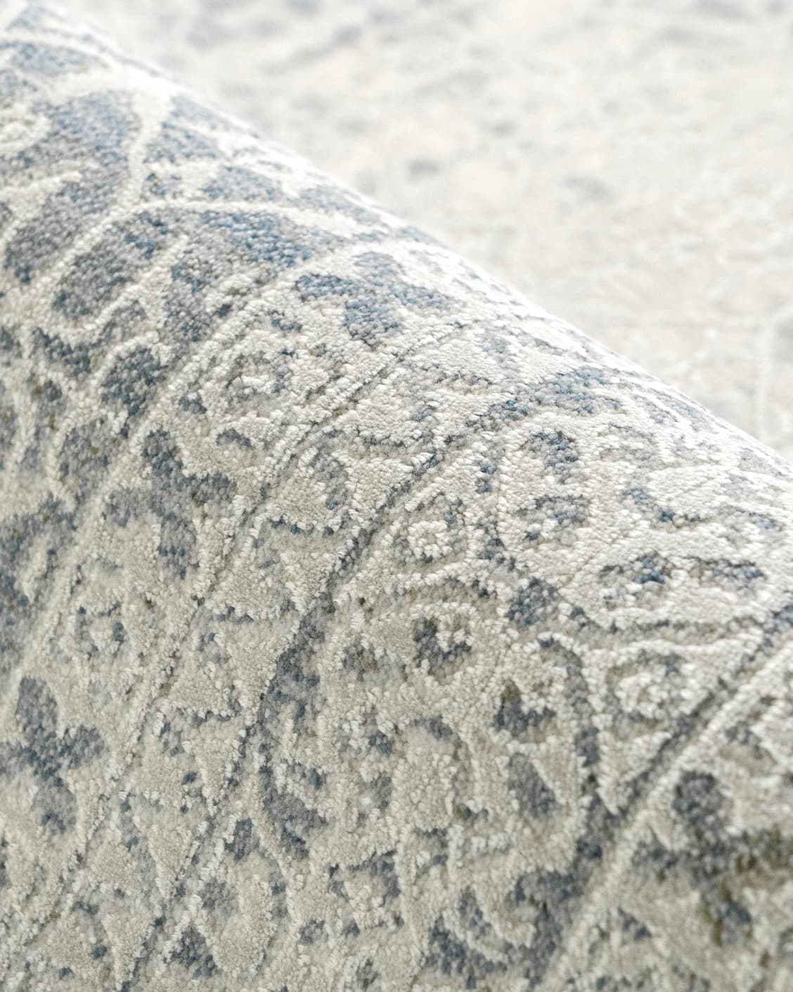 William Sandy carpet in beige, yellow and grey, shown in a product close-up as image 10