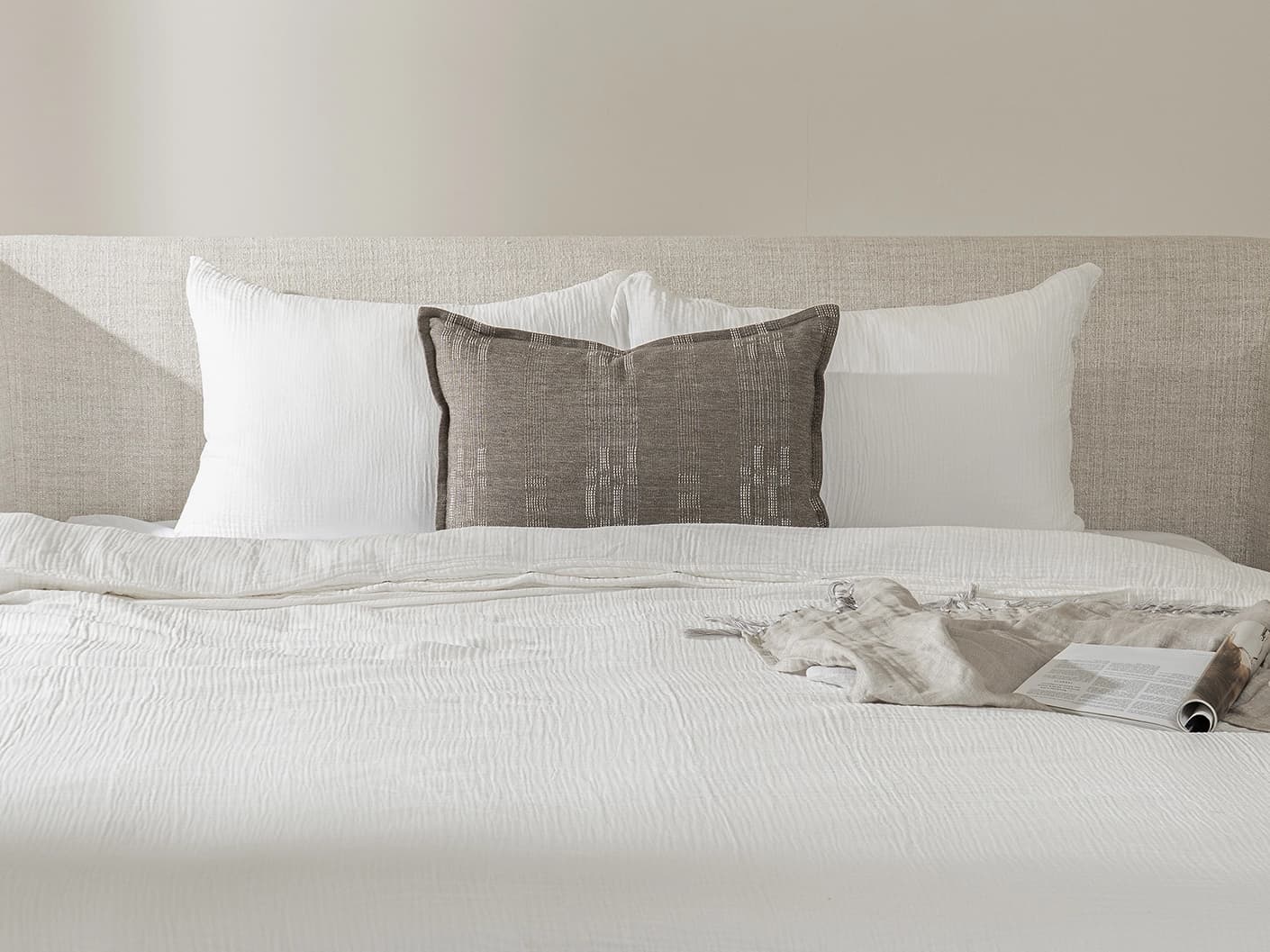 Yon Laurent III single cushions, shown in a lifestyle front view