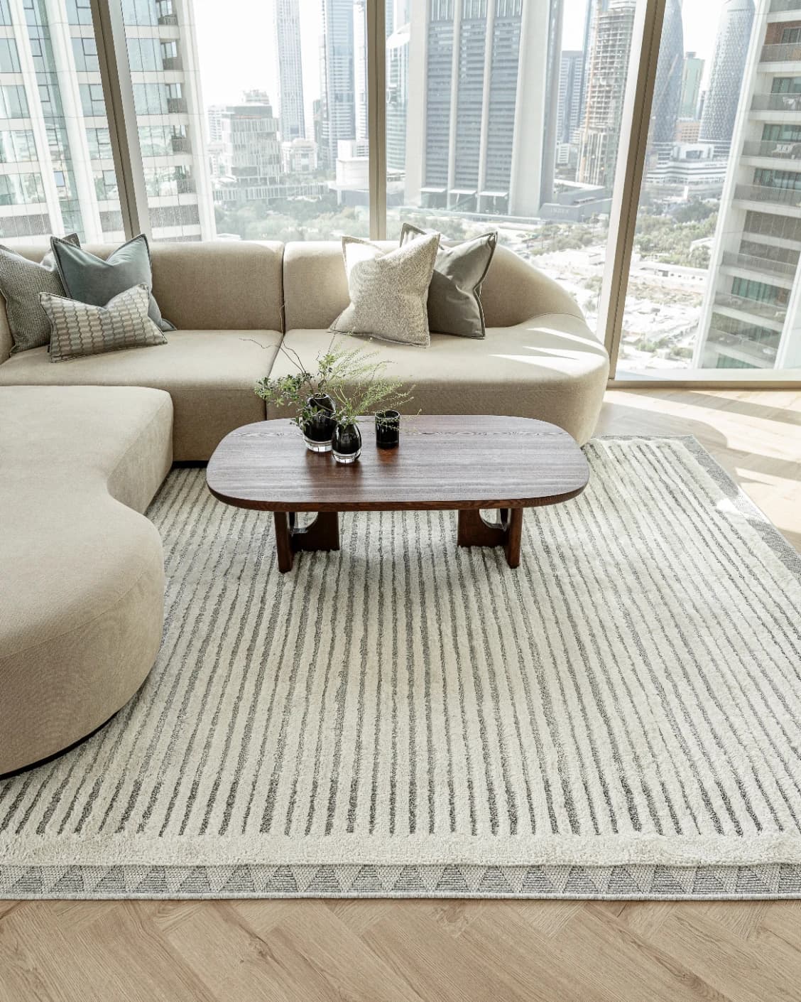 Zahra Alba carpet in ivory and grey, shown in a lifestyle front view as image 5