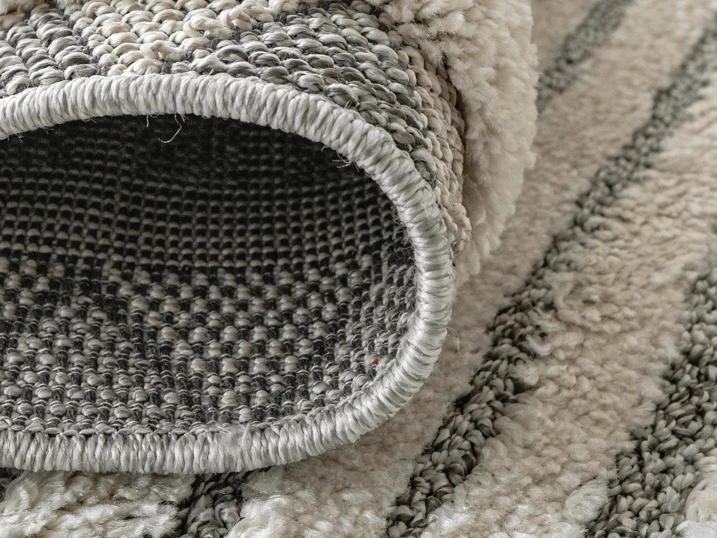 Zahra Alba carpet in ivory and grey, shown in a product close-up as image 10