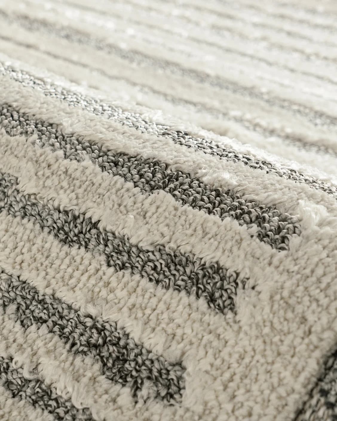 Zahra Alba carpet in ivory and grey, shown in a product close-up as image 11