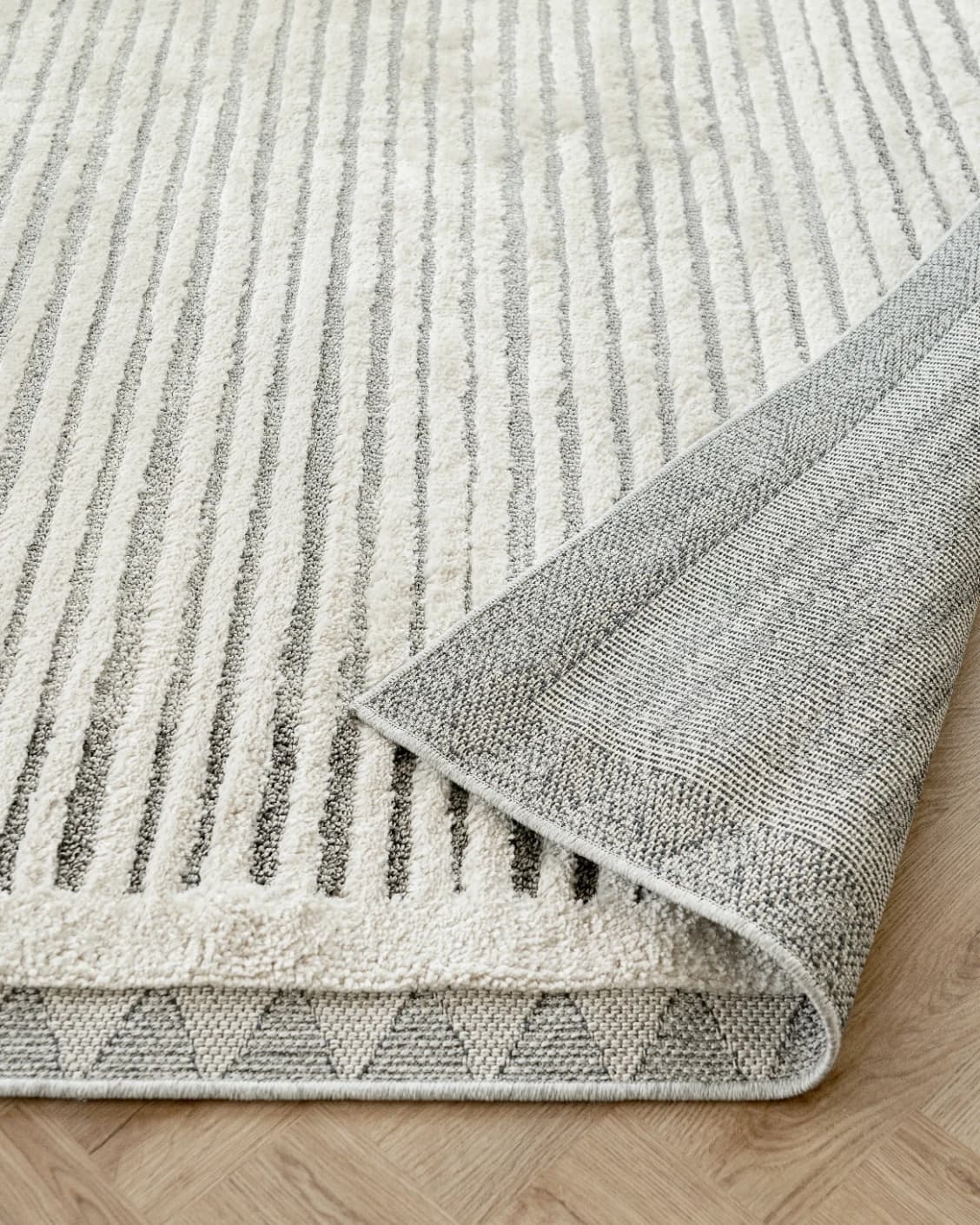 Zahra Alba carpet in ivory and grey, shown in a product close-up as image 12