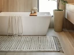 Zahra Alba Runners carpet in ivory and grey, shown in a lifestyle front view