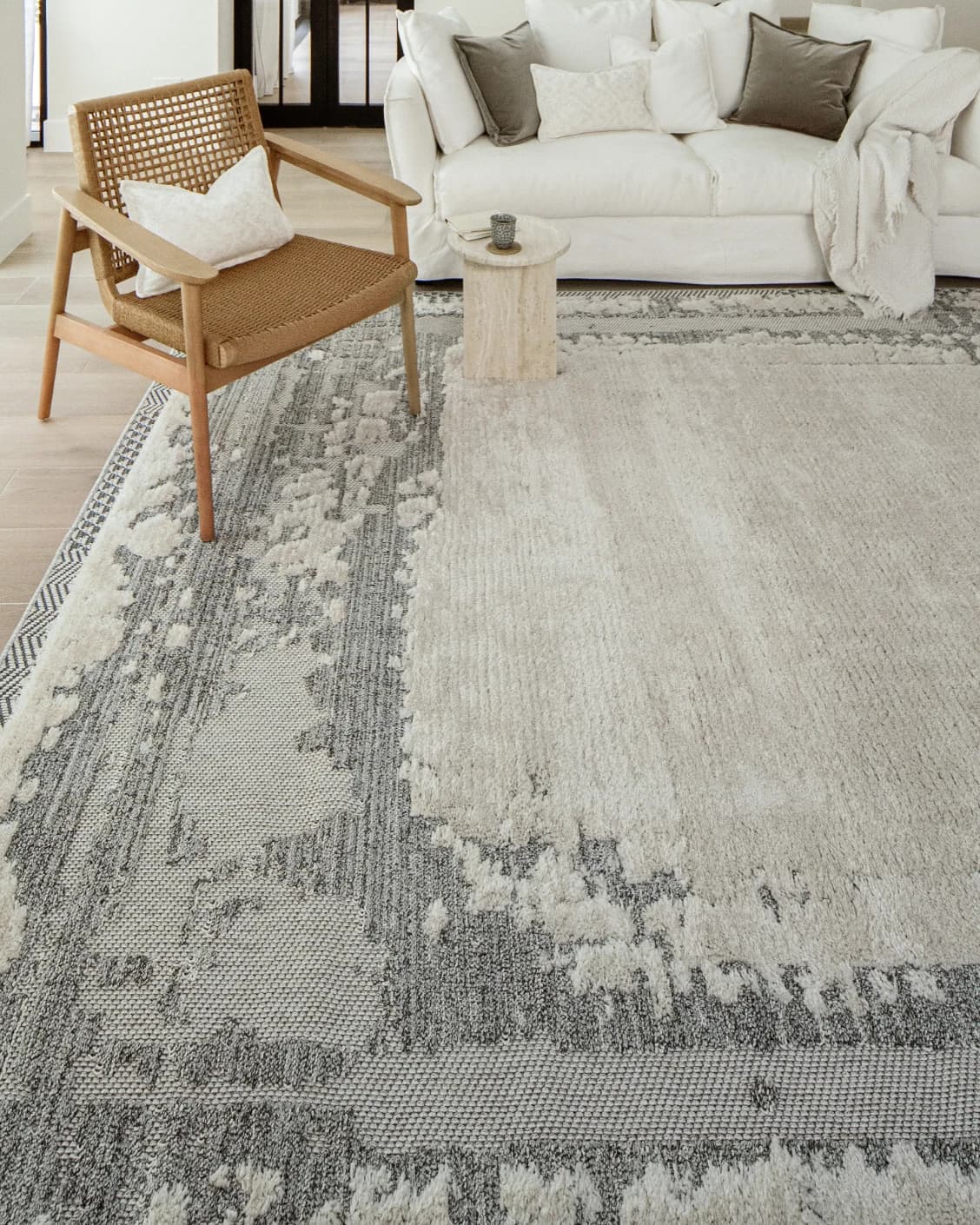 Zahra Bianca carpet in grey and ivory, shown in a lifestyle front view as image 4