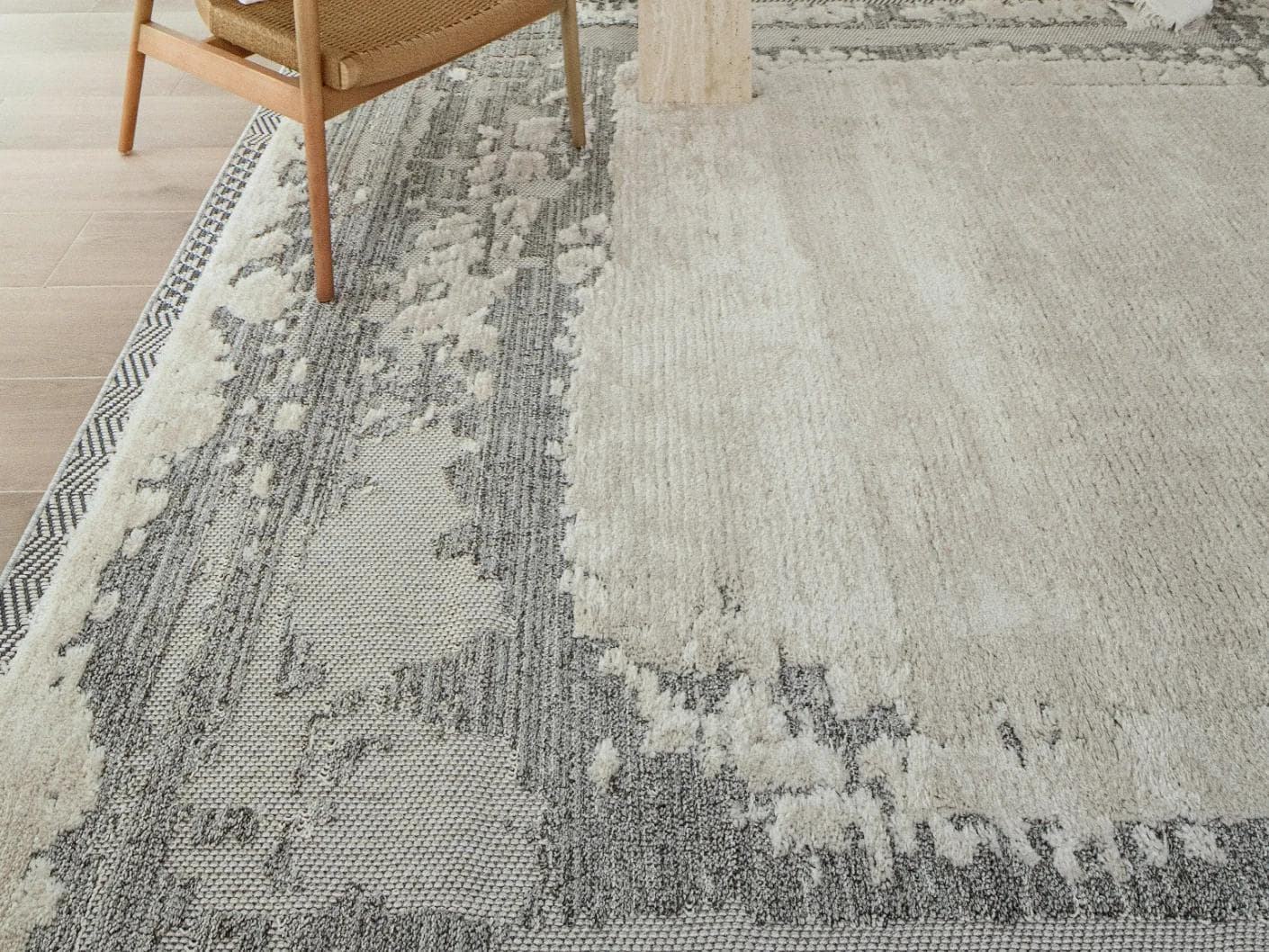 Zahra Bianca carpet in grey and ivory, shown in a lifestyle front view as image 4