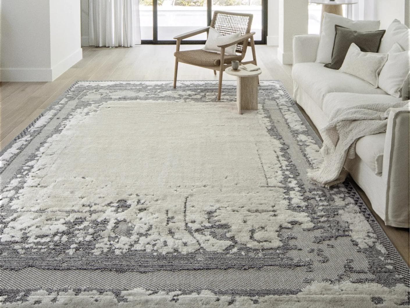Zahra Bianca carpet in grey and ivory, shown in a lifestyle front view as image 5