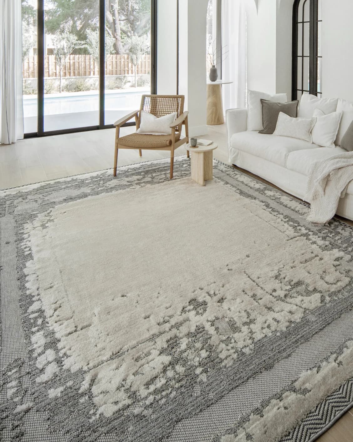 Zahra Bianca carpet in grey and ivory, shown in a lifestyle right view as image 6