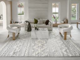 Zahra Snow carpet in grey and off white, shown in a lifestyle front view
