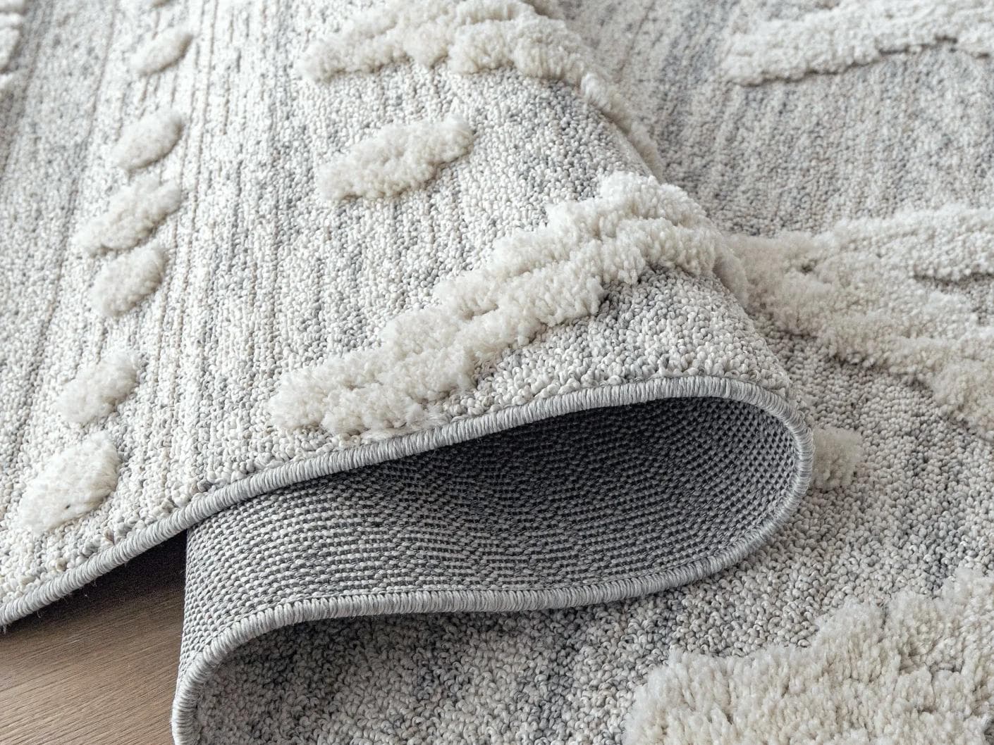 Zahra Snow carpet in grey and off white, shown in a product close-up as image 11