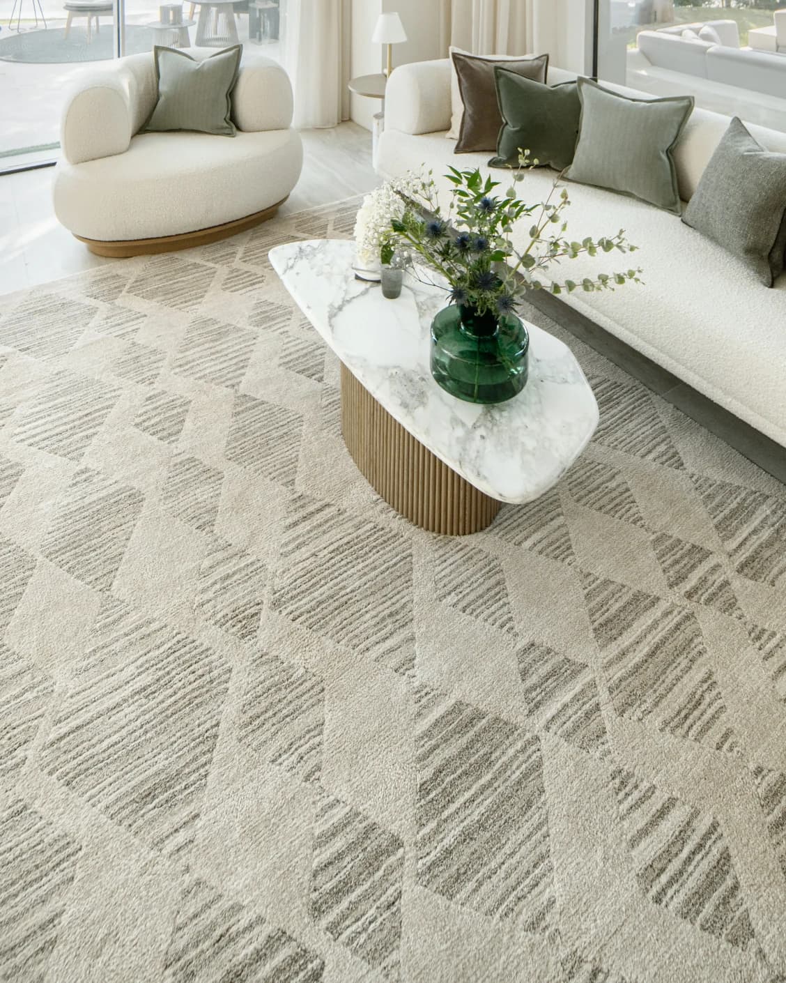 Zen Alba carpet in cream, beige and grey, shown in a lifestyle top view as image 8