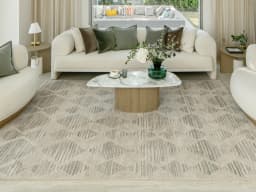 Zen Alba carpet in cream, beige and grey, shown in a lifestyle front view