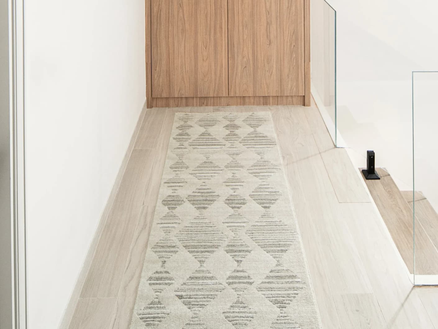 Zen Alba Runners carpet in cream, beige and grey, shown in a lifestyle front view