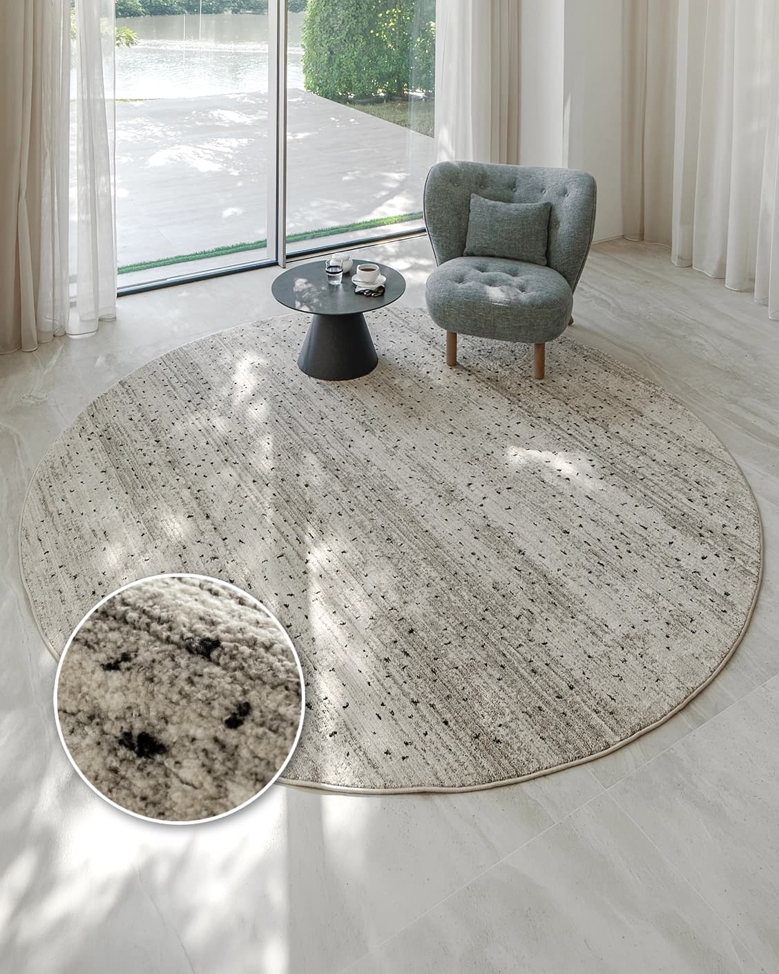 Zen Ashton Round carpet in beige, shown in a lifestyle top view