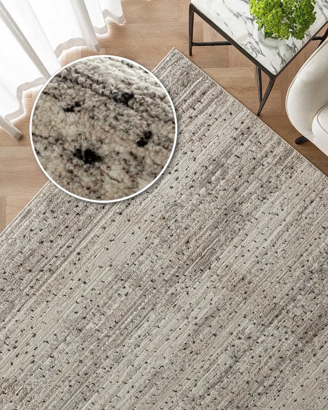 Zen Ashton carpet in beige, shown in a lifestyle top view as image 2