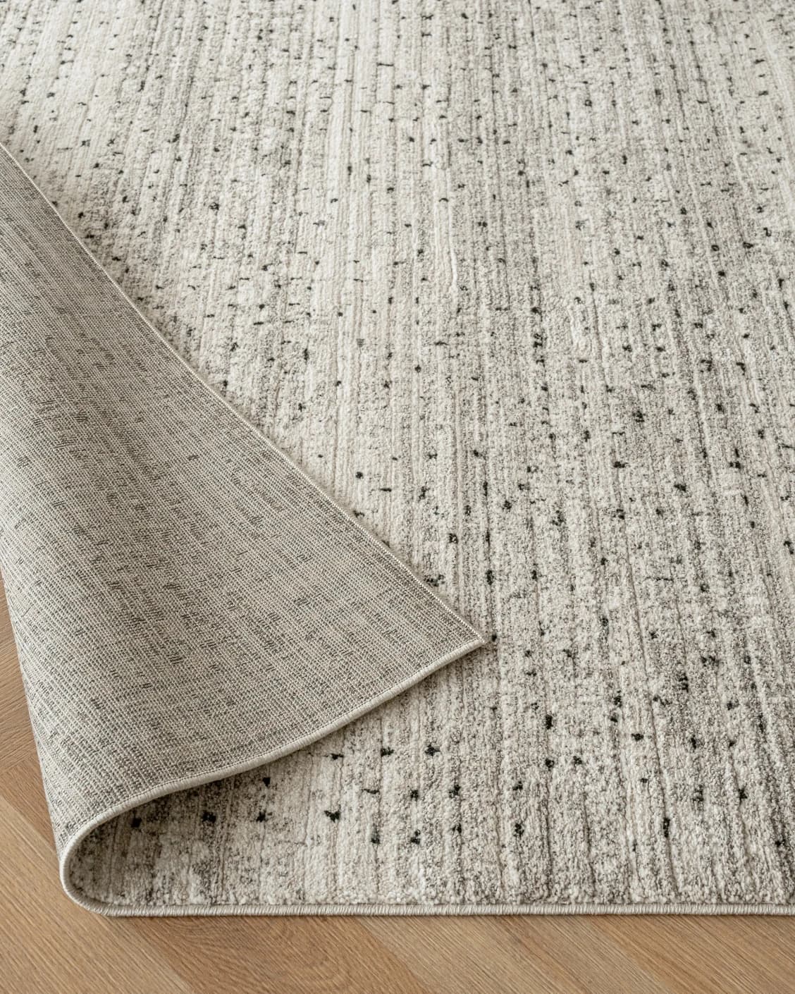 Zen Ashton carpet in beige, shown in a product close-up as image 9