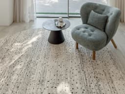 Zen Ashton carpet in beige, shown in a lifestyle front view