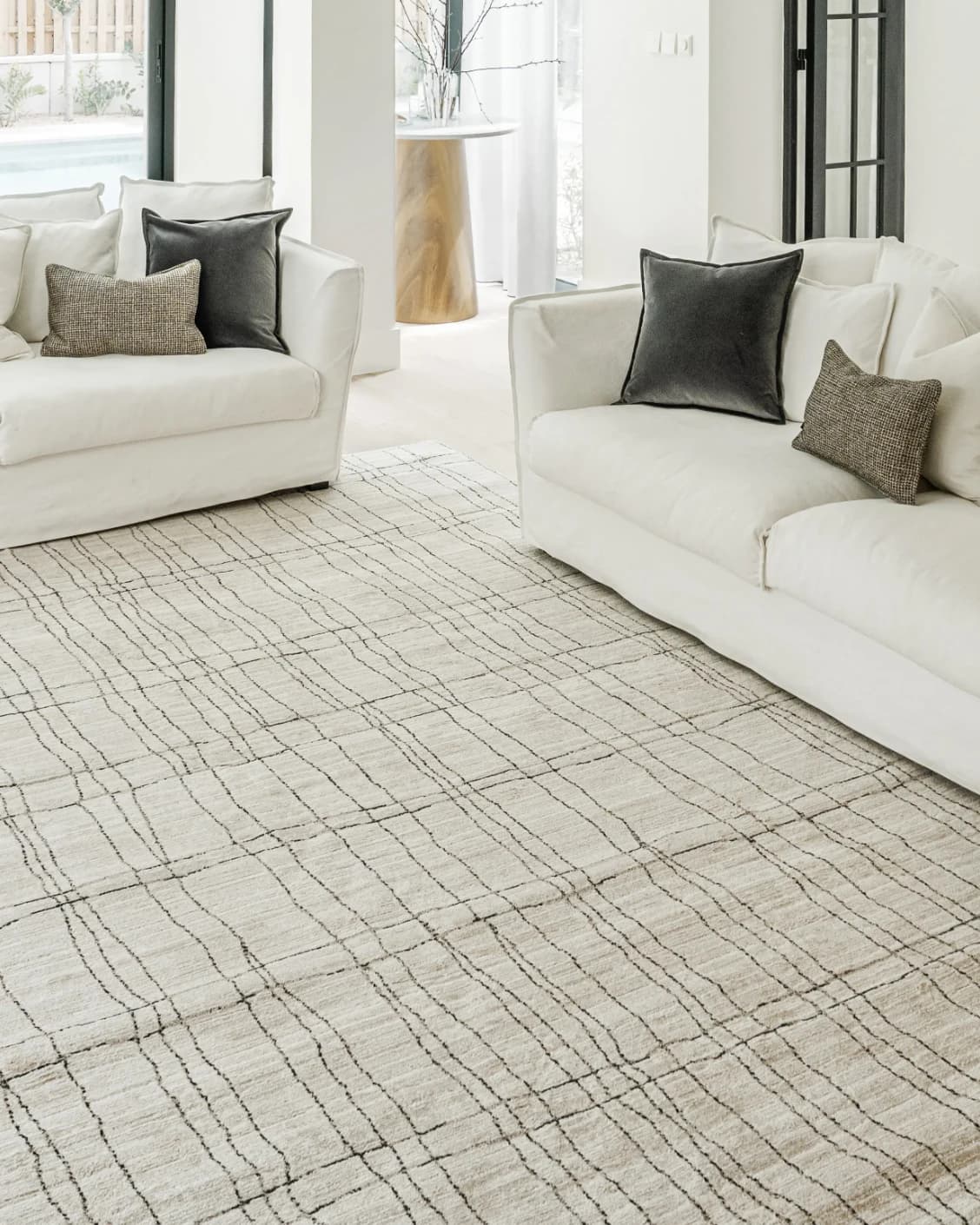 Zen Bianca carpet in charcoal and beige, shown in a lifestyle right view as image 7