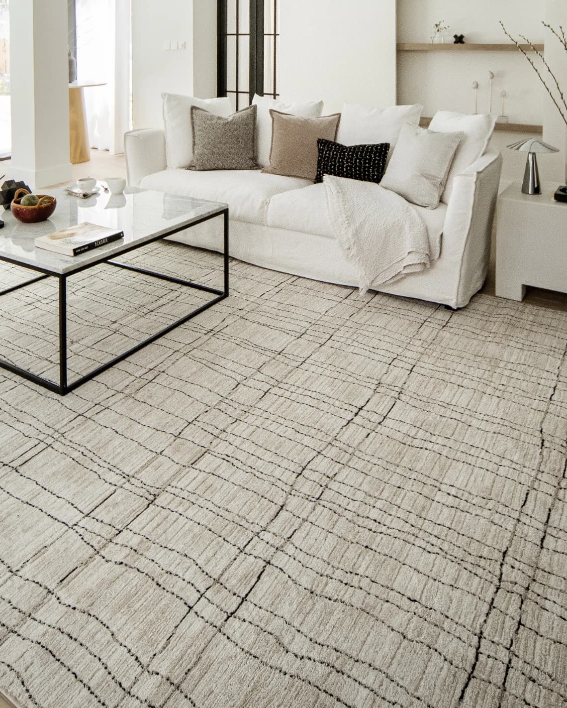 Zen Bianca carpet in charcoal and beige, shown in a lifestyle right view as image 8