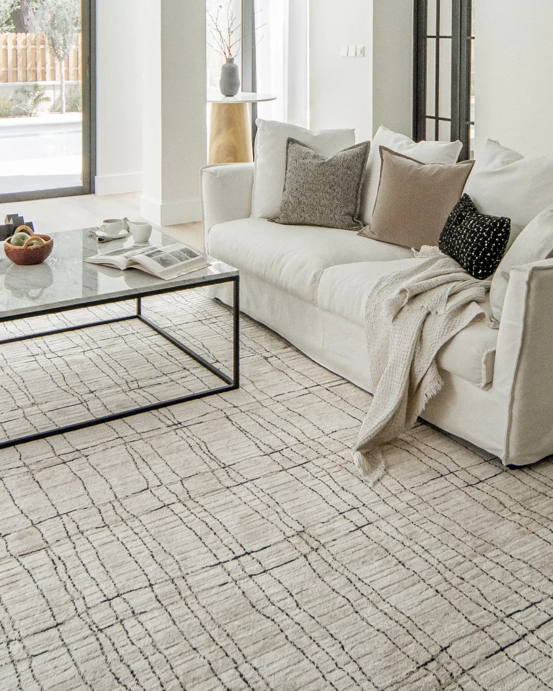 Zen Bianca carpet in charcoal and beige, shown in a lifestyle right view as image 9