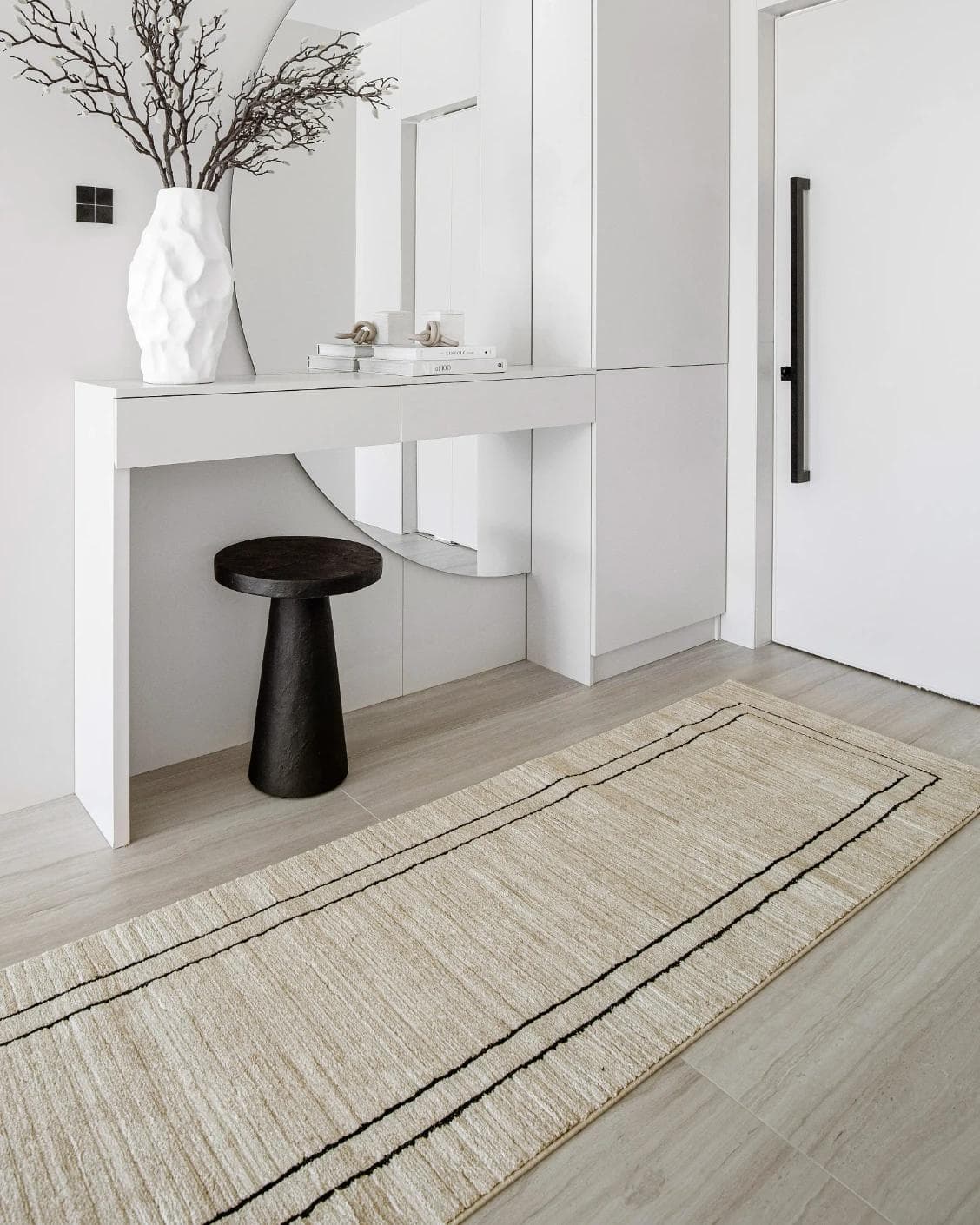 Zen Colin Runners carpet in black and beige, shown in a lifestyle left view as image 5