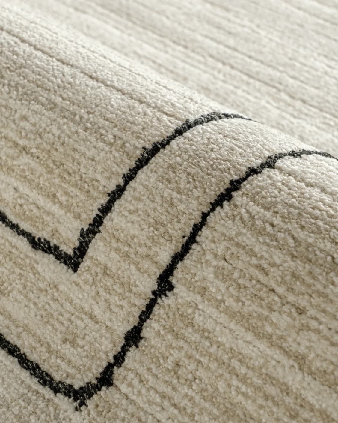 Zen Colin carpet in black and beige, shown in a product close-up as image 13