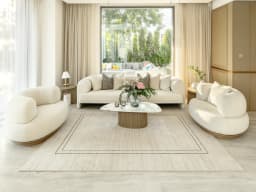 Zen Colin carpet in black and beige, shown in a lifestyle front view