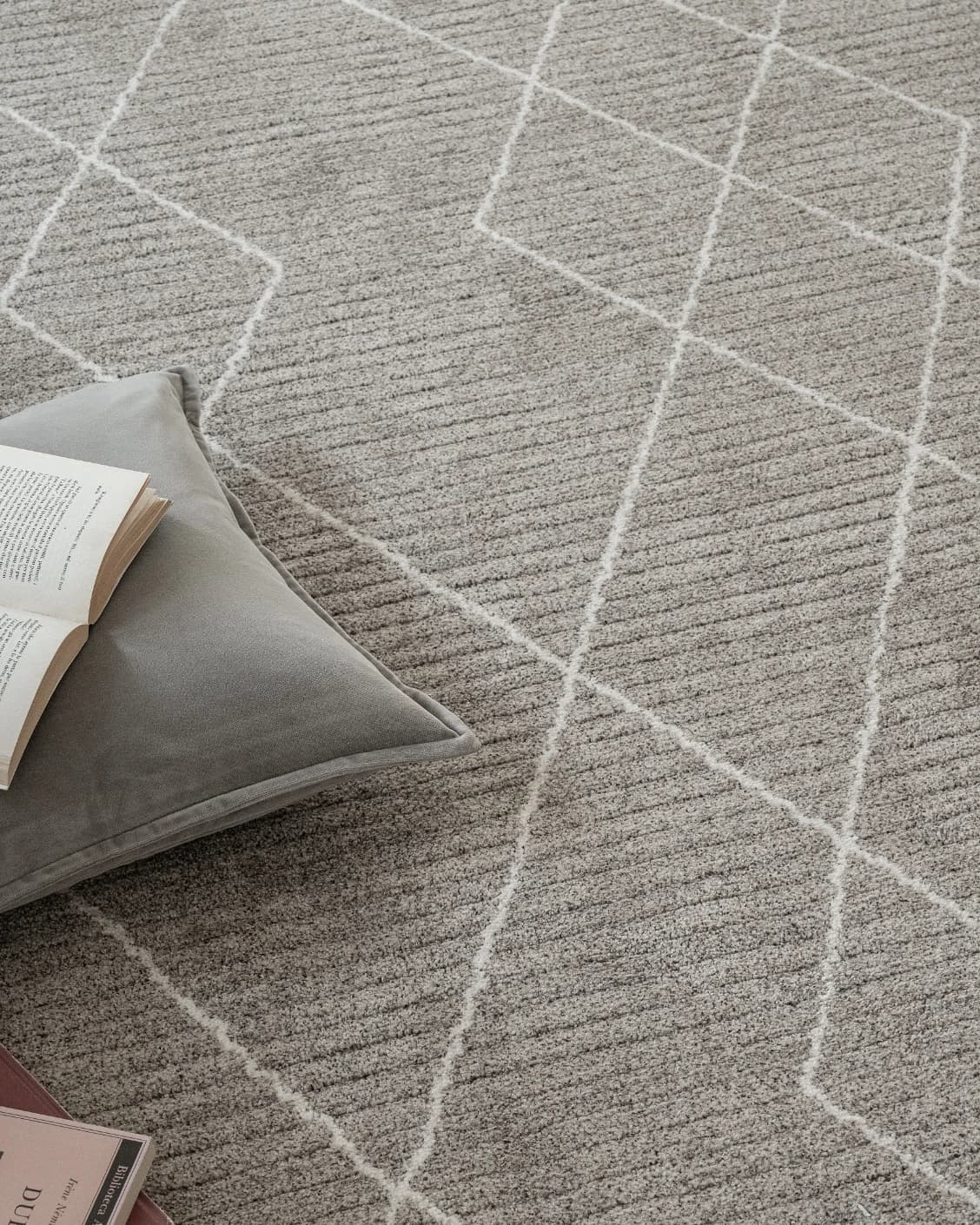 Zen Dune carpet in grey and off white, shown in a lifestyle top view as image 8