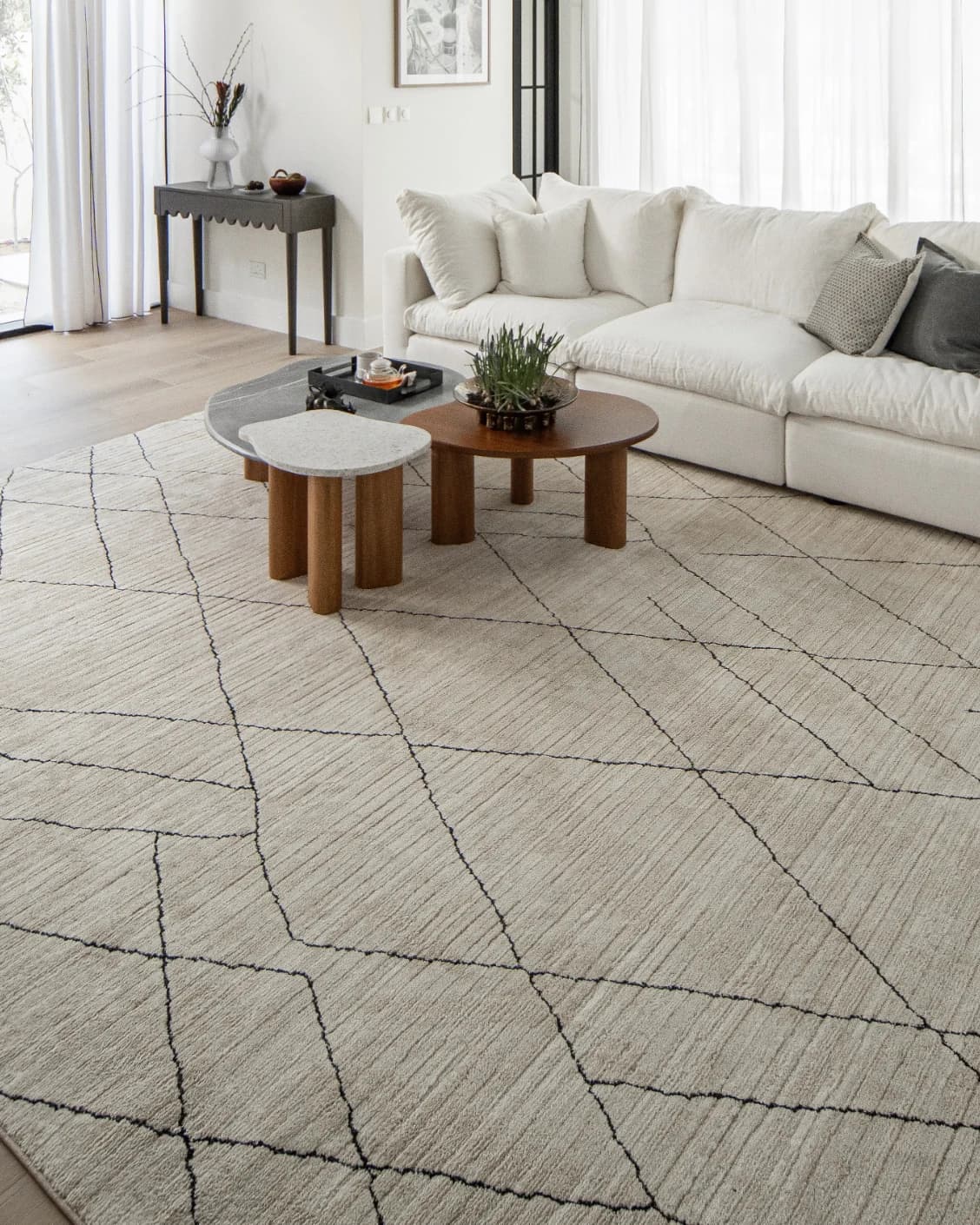 Zen Pearl carpet in charcoal and ivory, shown in a lifestyle right view as image 9