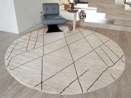 Zen Pearl Round carpet in pearl, charcoal and ivory, shown in a lifestyle front view