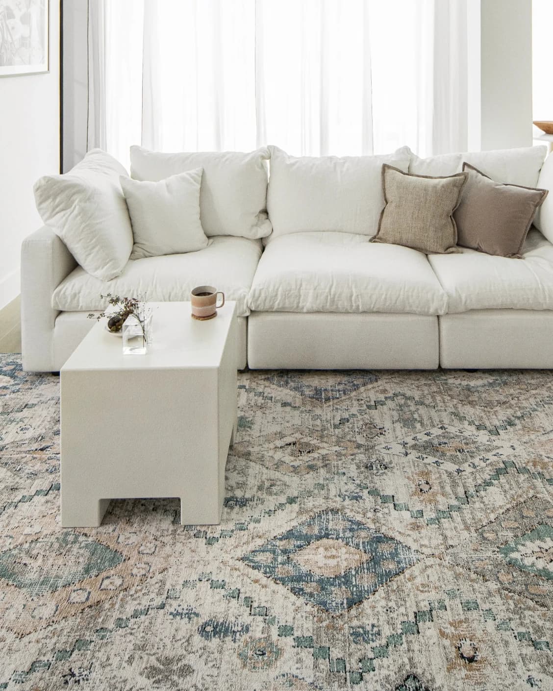 Zen Sandy carpet in beige and blue, shown in a lifestyle front view as image 6