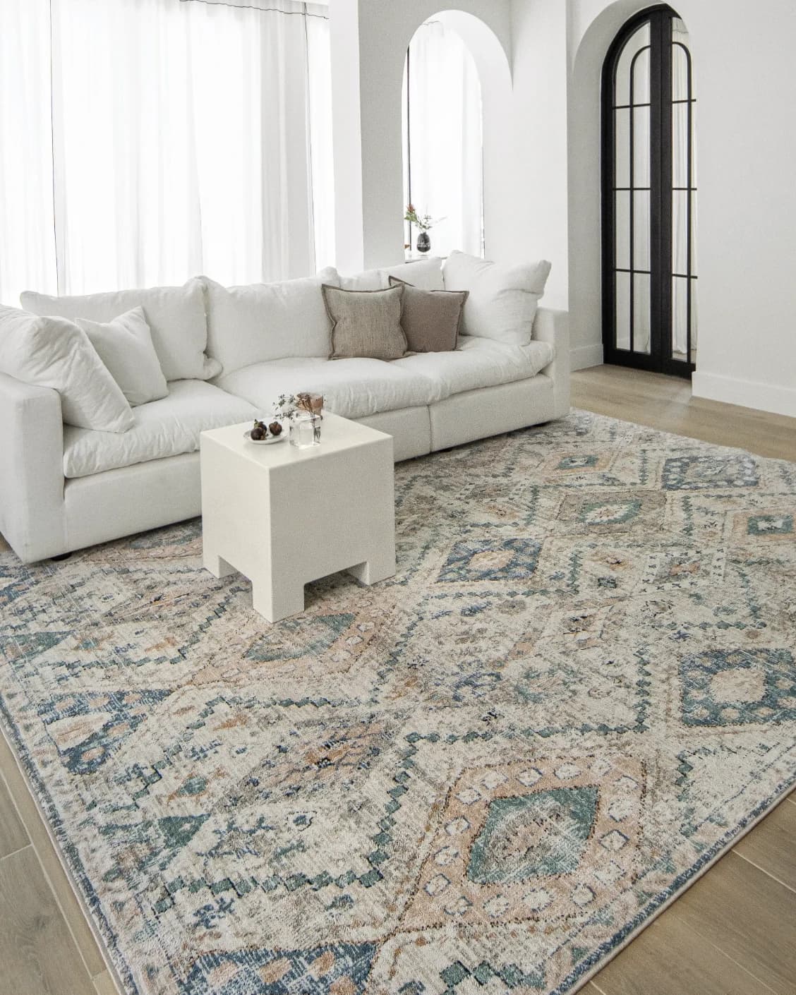 Zen Sandy carpet in beige and blue, shown in a lifestyle left view as image 9