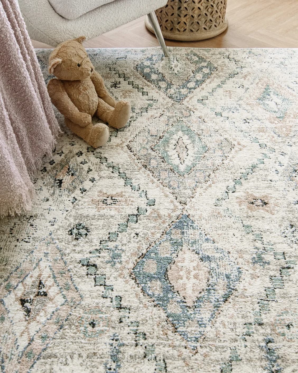 Zen Sandy carpet in beige and blue, shown in a lifestyle top view as image 15
