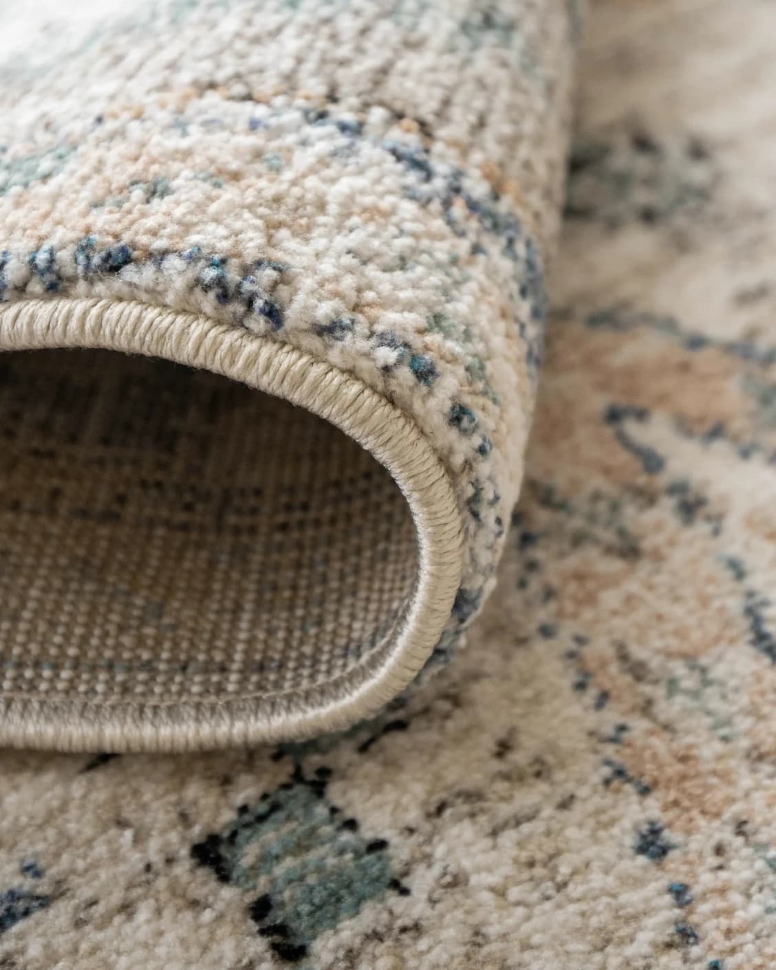 Zen Sandy carpet in beige and blue, shown in a product close-up as image 18