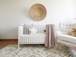 Zen Sandy carpet in sandy, beige and blue, shown in a lifestyle front view