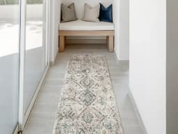 Zen Sandy Runners carpet in beige and blue, shown in a lifestyle front view