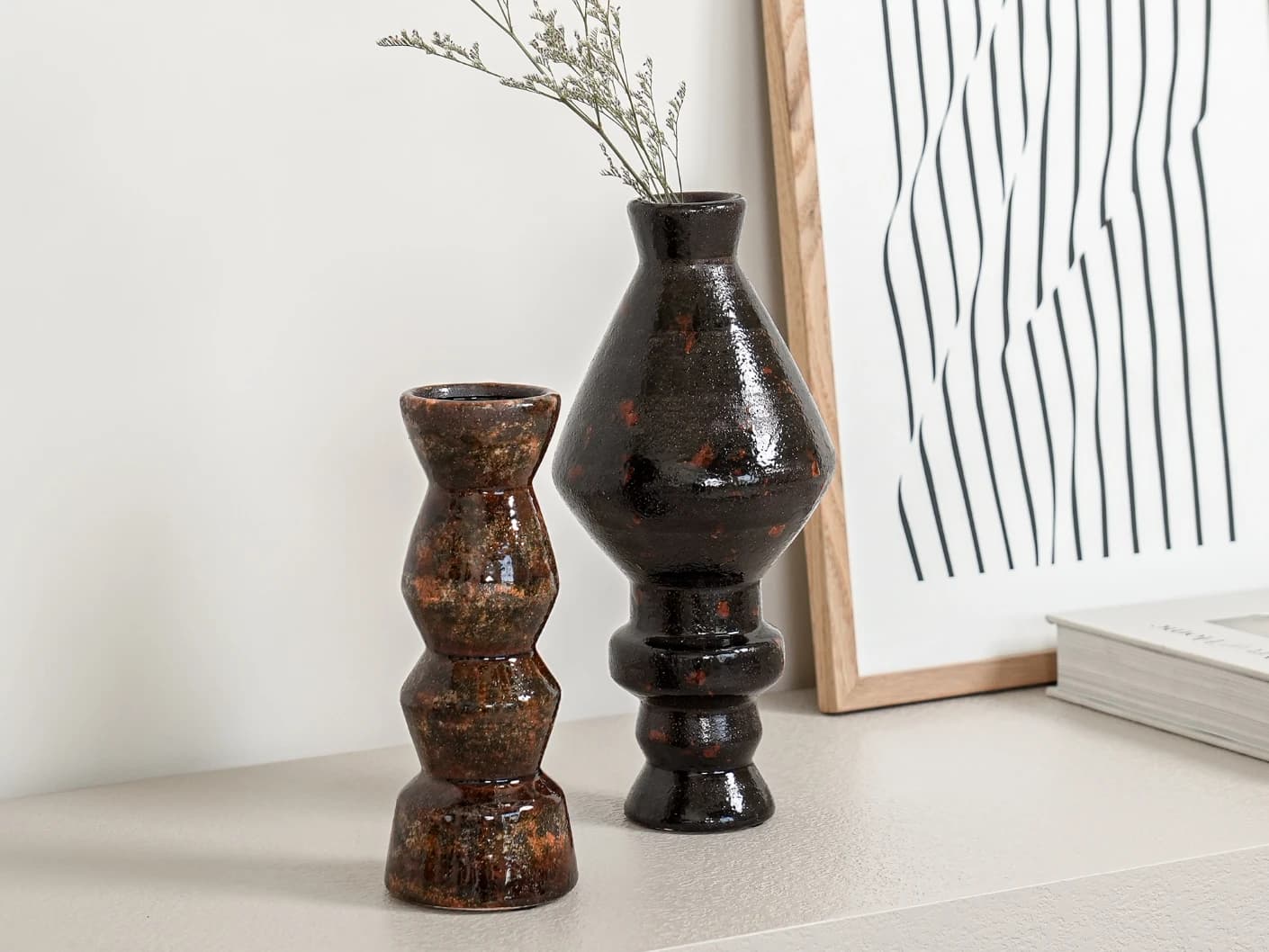 Zenith Terra Bundle statues and sculptures in brown and black, shown in a lifestyle left view